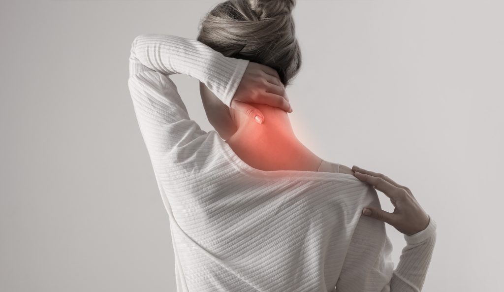 Auto Accidents in Orlando, Florida - Personal Injury Claims PIP Woman experiencing neck pain after an auto accident, highlighting MOOV Labs Orlando’s cryotherapy, red light therapy, and injury recovery services for whiplash and soft tissue trauma.