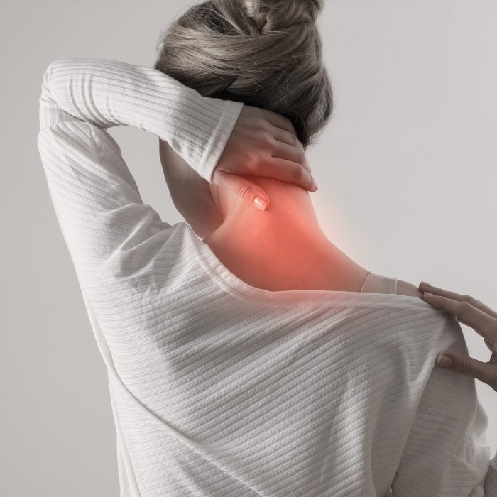 Auto Accidents in Orlando, Florida - Personal Injury Claims PIP Woman experiencing neck pain after an auto accident, highlighting MOOV Labs Orlando’s cryotherapy, red light therapy, and injury recovery services for whiplash and soft tissue trauma.