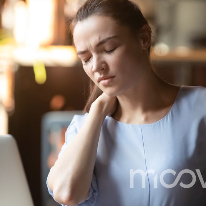 Fibromyalgia Pain Relief in Orlando Florida at MOOV Labs Woman feeling pain and needs to receive red light therapy at Moov Labs Orlando for fibromyalgia pain relief and improved muscle recovery.