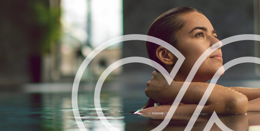 best iv and nad+ therapy in orlando, florida Woman relaxing in hydrotherapy pool, representing Moov Labs Orlando’s rejuvenating NAD+ and IV therapy services.