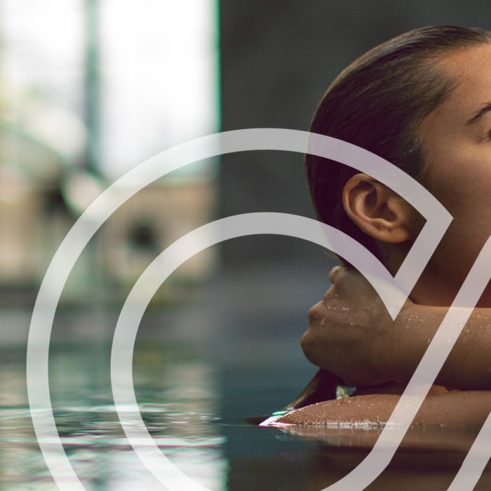 best iv and nad+ therapy in orlando, florida Woman relaxing in hydrotherapy pool, representing Moov Labs Orlando’s rejuvenating NAD+ and IV therapy services.