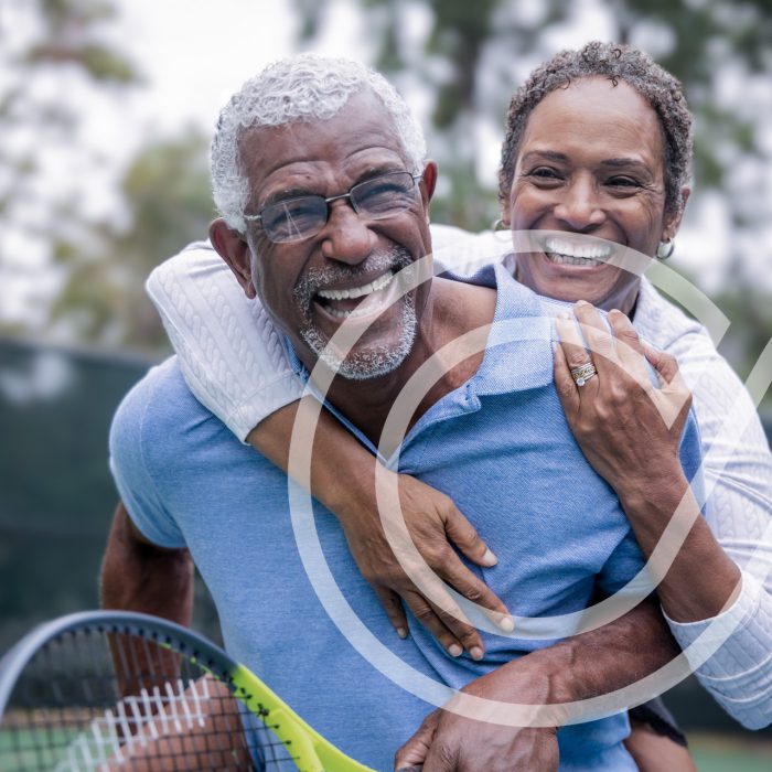 Best Anti-Aging in Orlando with Cryo Services Slow Down the Aging Process with Anti-Aging Recovery in Orlando Happy senior couple playing tennis outdoors in Orlando, Florida. Active aging, wellness, and recovery solutions for a vibrant life.